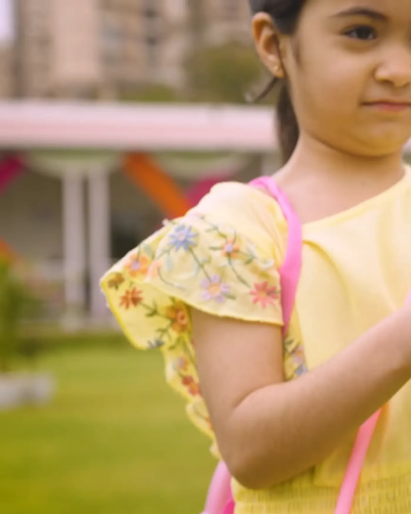A child using a Fun Machines water gun in a garden