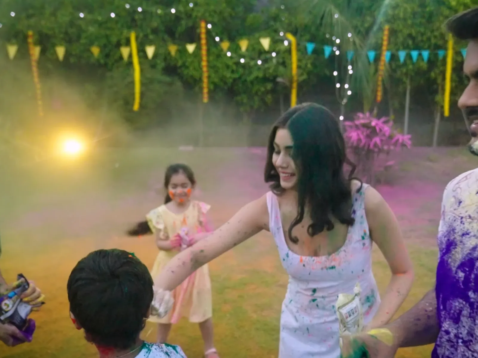 Holi gulal in several shades being played with outdoors