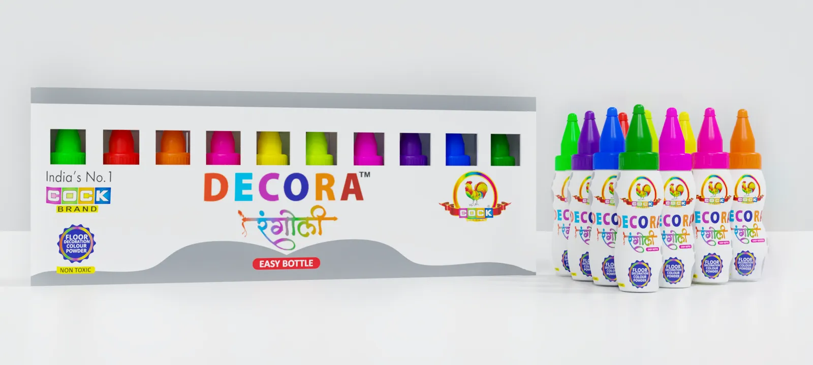 A row of Decora rangoli colours in easy-pour bottles